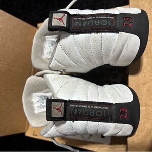 Jordan Retro 12 White and Black Sneakers with Quilted Leather